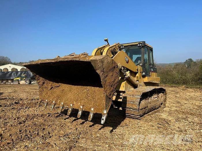 CAT 973C - Специальные экскаваторы