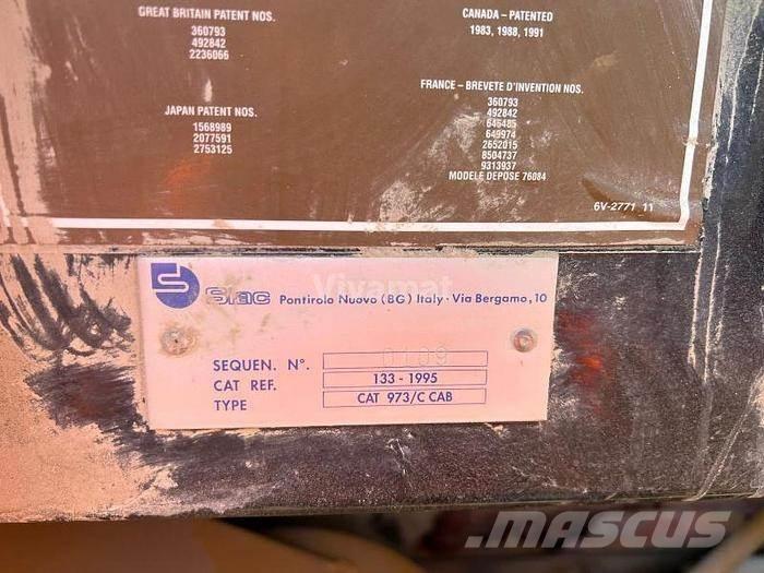 CAT 973C - Специальные экскаваторы