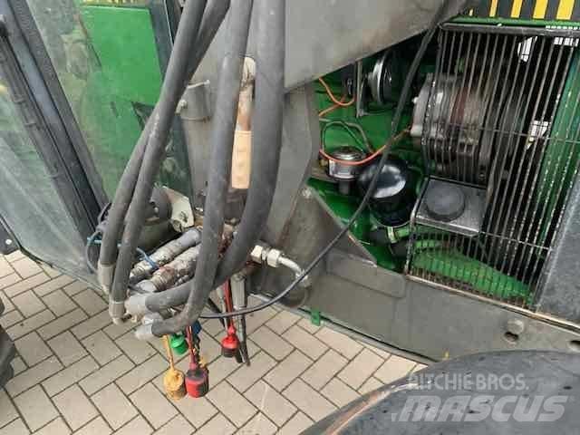 John Deere 2450 Трактора
