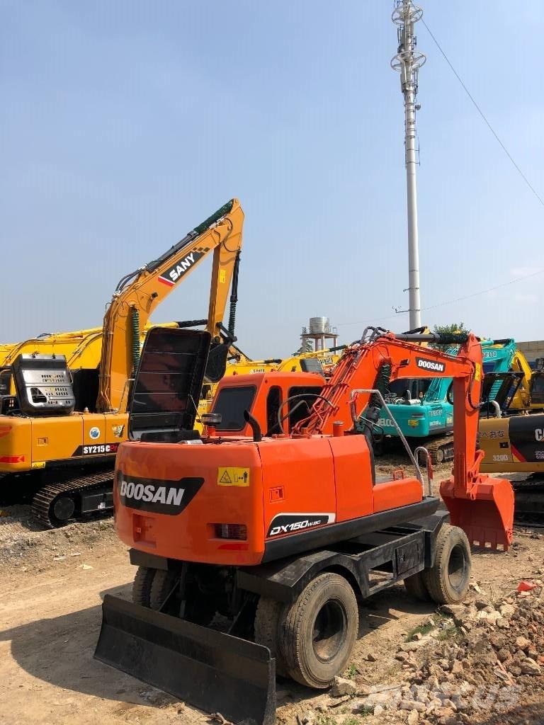 Doosan DX150W Колёсные экскаваторы
