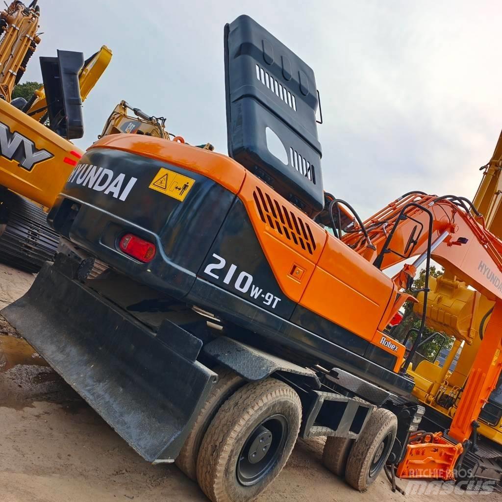Hyundai 210W-9 Колёсные экскаваторы