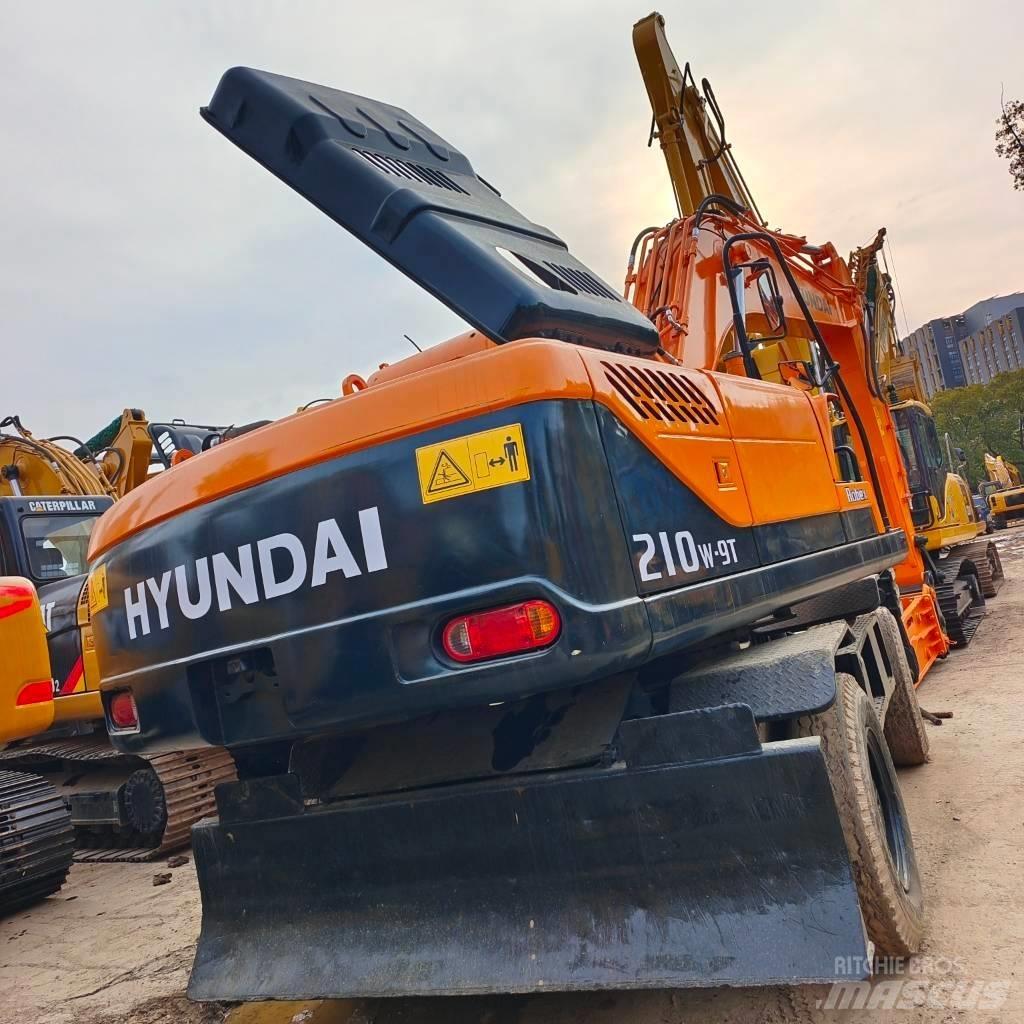Hyundai 210W-9 Колёсные экскаваторы