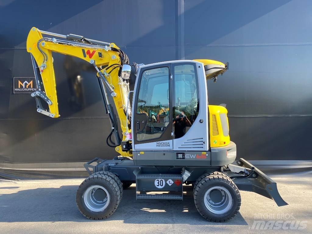 Wacker Neuson EW65 Колёсные экскаваторы