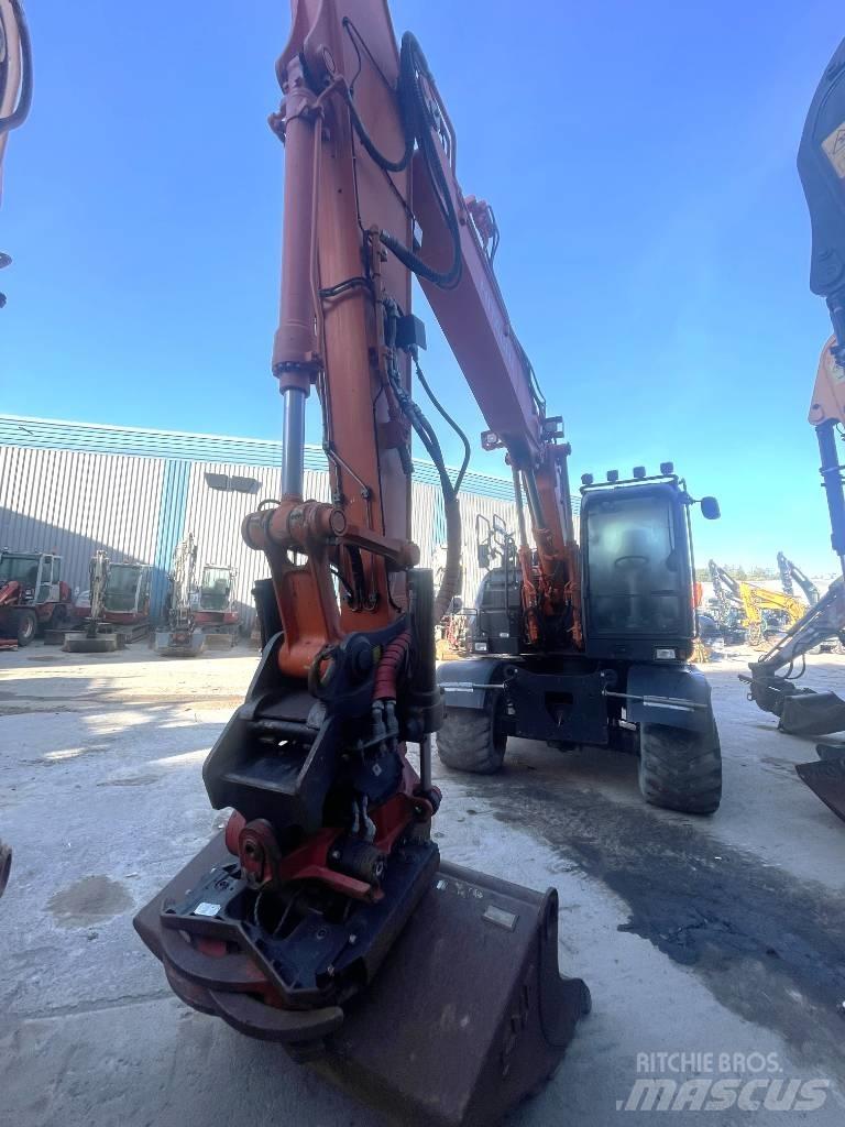 Hitachi 140W-6 Колёсные экскаваторы