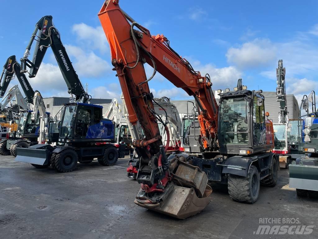 Hitachi 140W-6 Колёсные экскаваторы