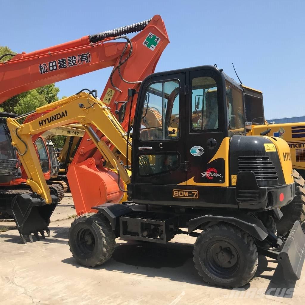 Hyundai 60 W Колёсные экскаваторы