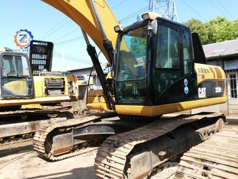 CAT 323 D L Гусеничные экскаваторы
