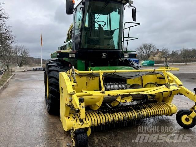 John Deere 6950 Самоходные кормоуборочные комбайны