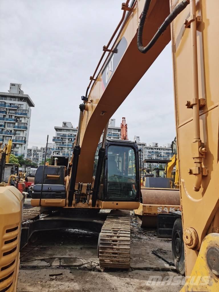 CAT 323D Гусеничные экскаваторы