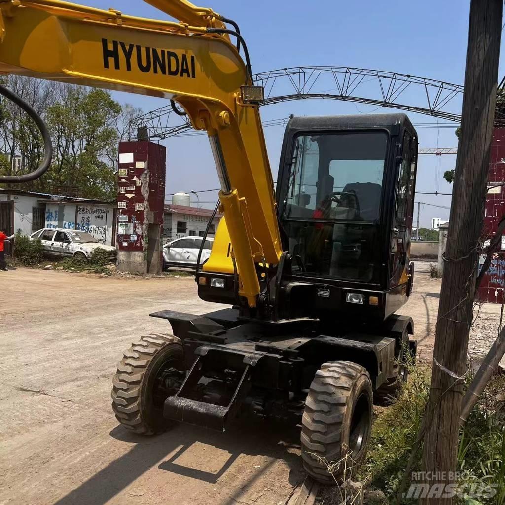 Hyundai R60W-7 Колёсные экскаваторы
