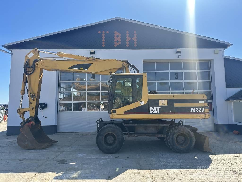 CAT M 320 VAH Колёсные экскаваторы