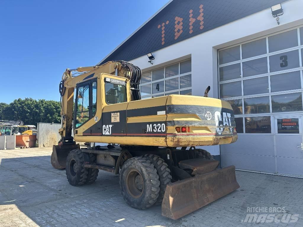 CAT M 320 VAH Колёсные экскаваторы