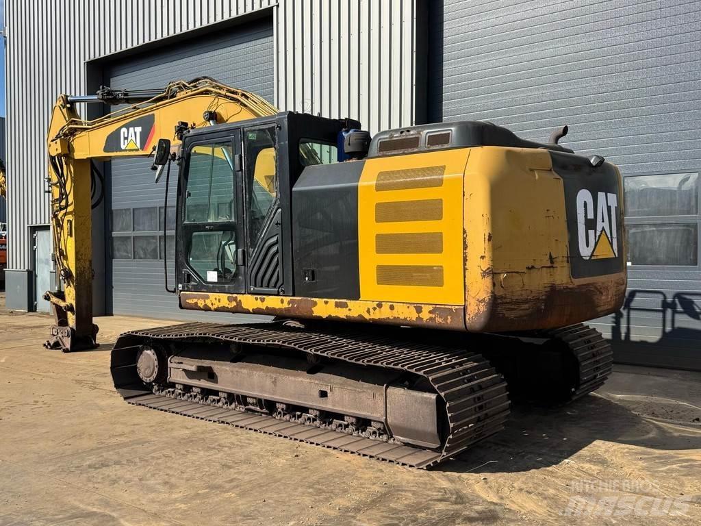 CAT 323EL Гусеничные экскаваторы