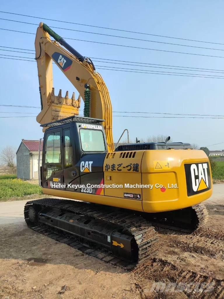 CAT 323 Гусеничные экскаваторы