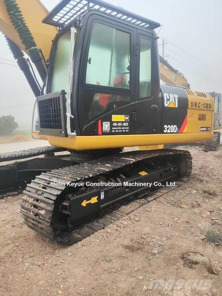 CAT 323 Гусеничные экскаваторы