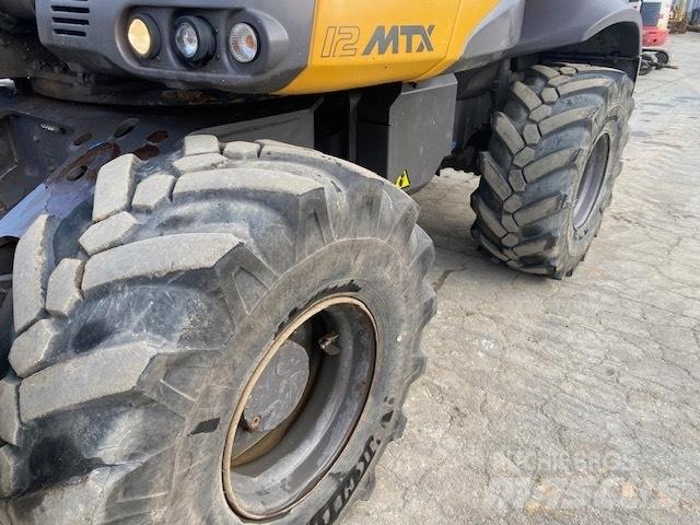 Mecalac 12 M TX Колёсные экскаваторы