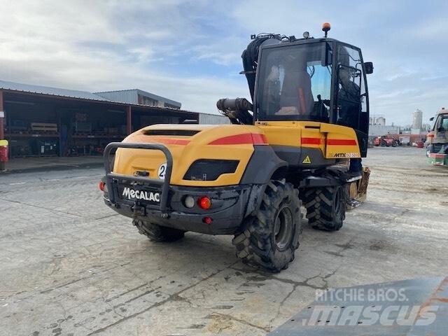 Mecalac 12 M TX Колёсные экскаваторы