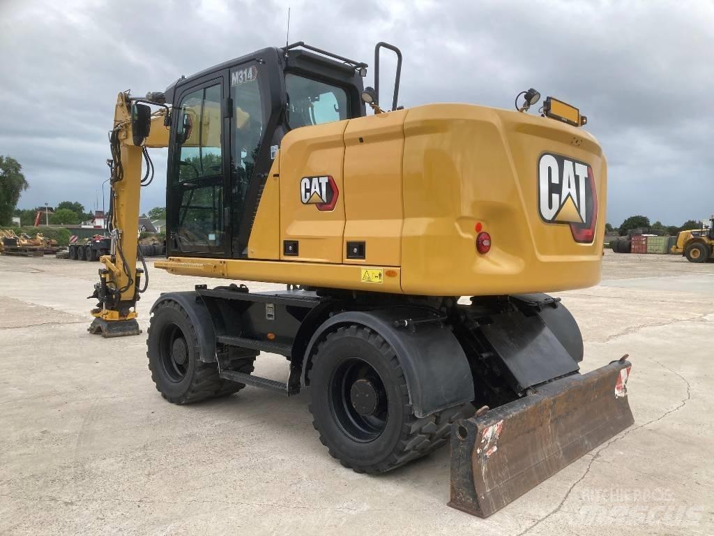 CAT M314 Колёсные экскаваторы