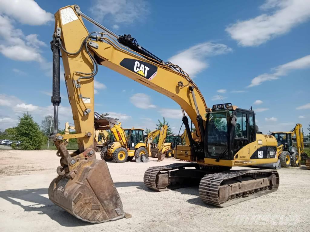 CAT 323 D L Гусеничные экскаваторы