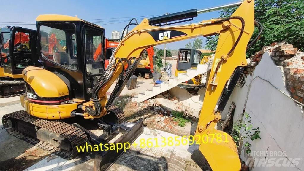 CAT 303 CR Мини-экскаваторы