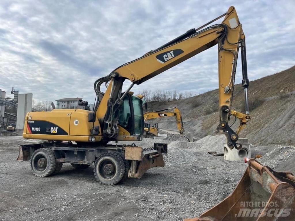CAT M318D Колёсные экскаваторы