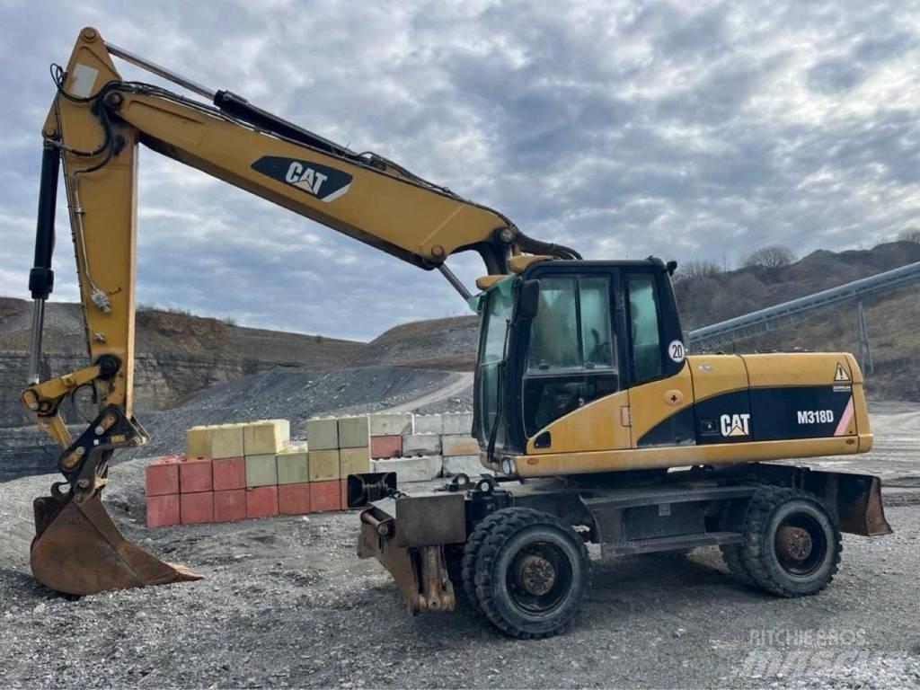 CAT M318D Колёсные экскаваторы