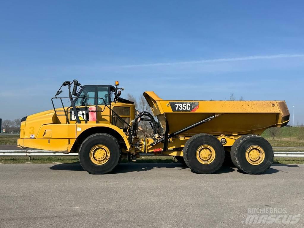 CAT 735C Шарнирно-сочленённые самосвалы