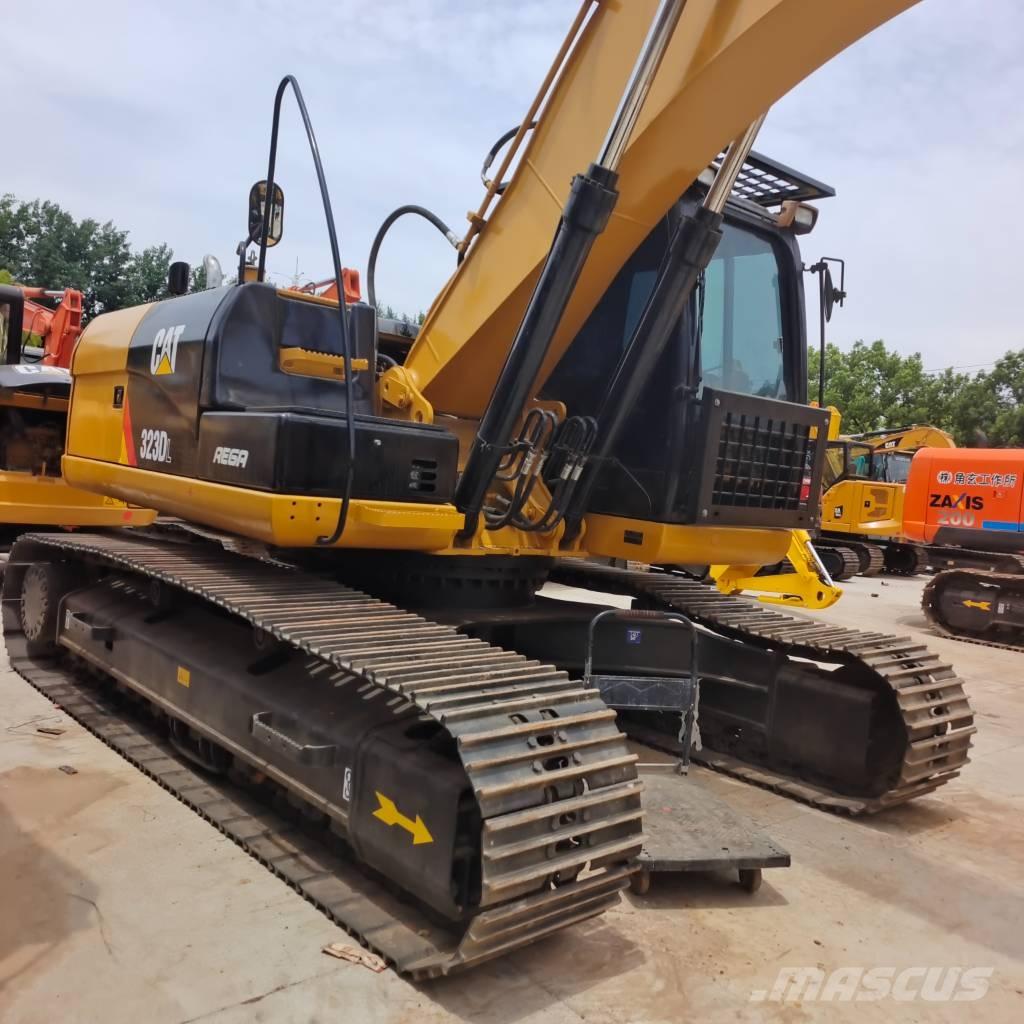 CAT 323 Гусеничные экскаваторы