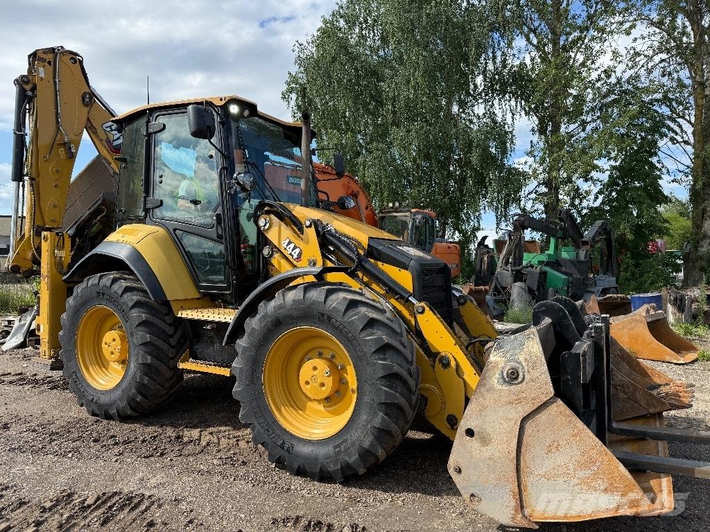 CAT 444 Экскаваторы-погрузчики