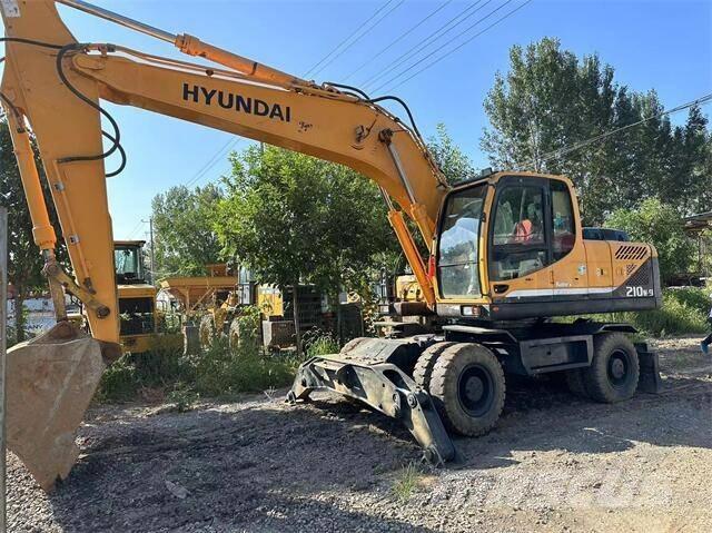 Hyundai 210W Колёсные экскаваторы