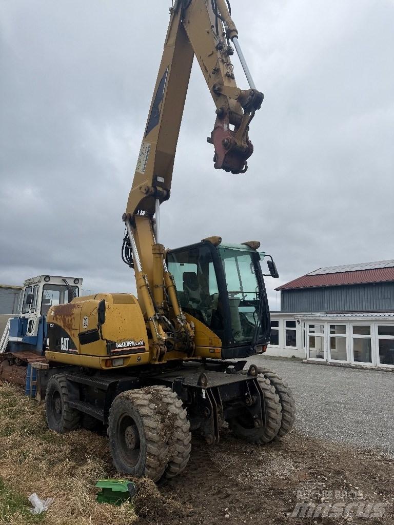CAT M 313 C Колёсные экскаваторы
