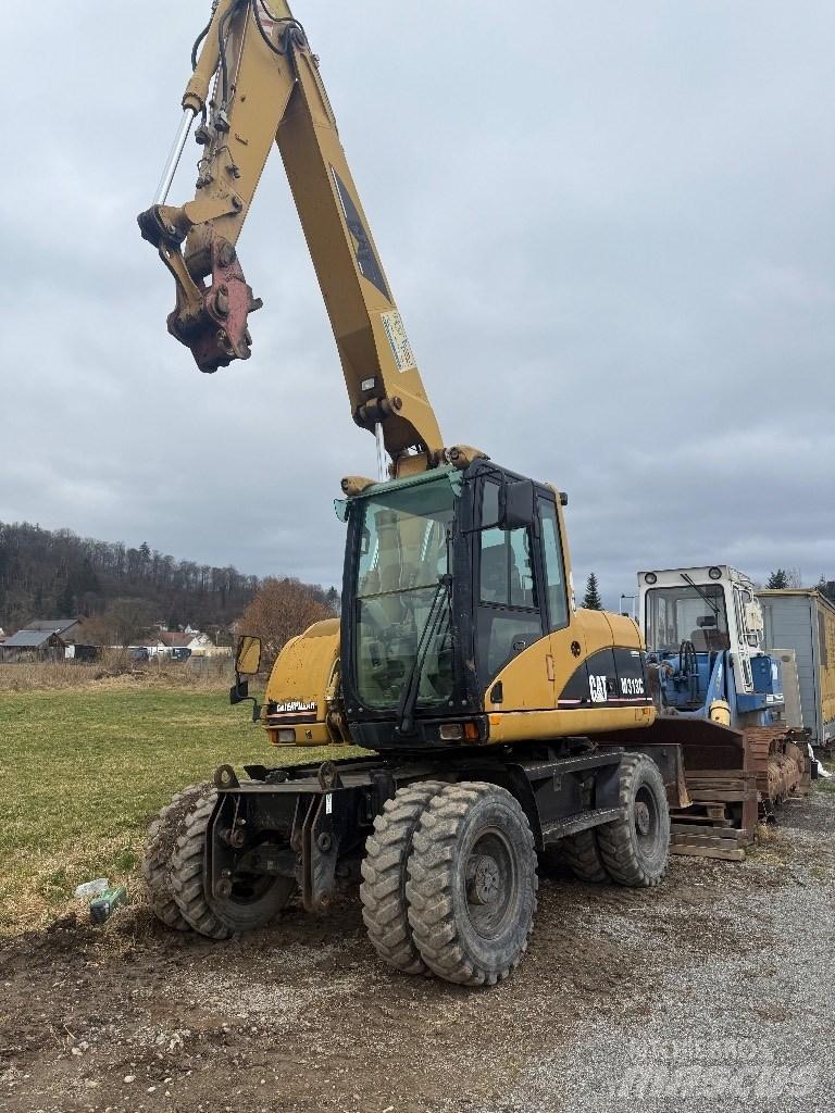 CAT M 313 C Колёсные экскаваторы