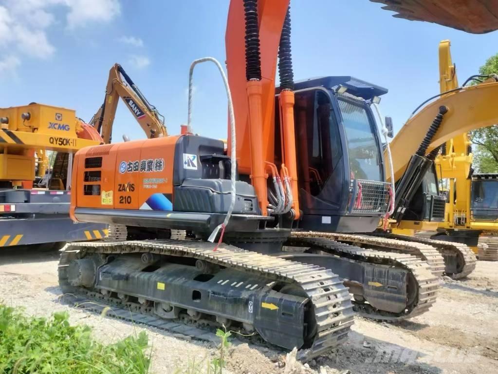 Hitachi ZX 210 Гусеничные экскаваторы