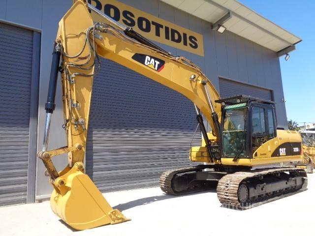 CAT 323 D L Гусеничные экскаваторы