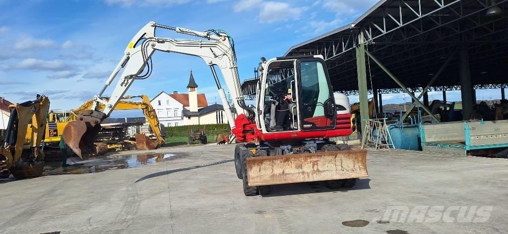 Takeuchi TB 295 W Колёсные экскаваторы