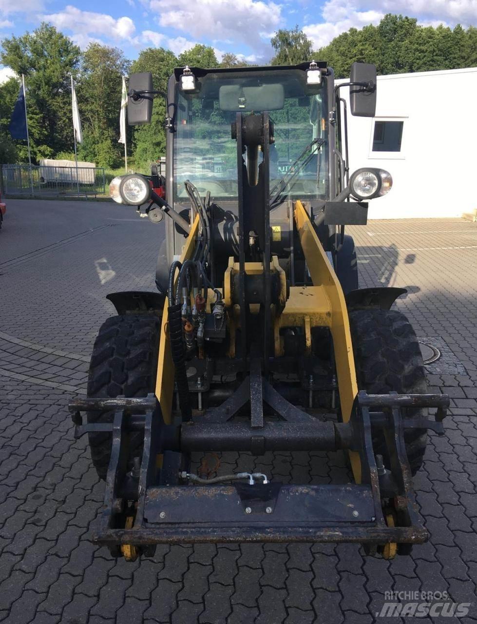 New Holland W50c Фронтальные погрузчики