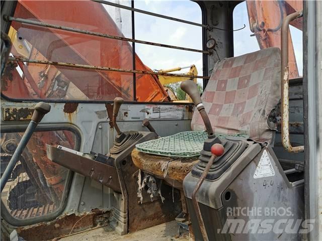 Hitachi EX200-1 Гусеничные экскаваторы