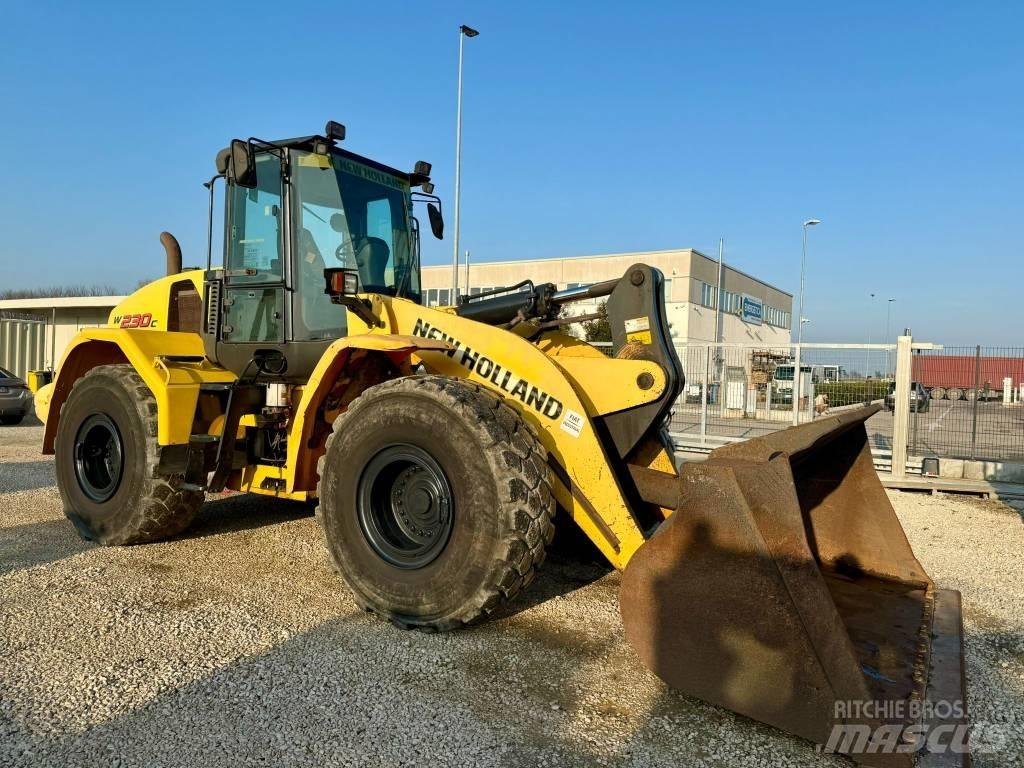 New Holland W 230 C Фронтальные погрузчики