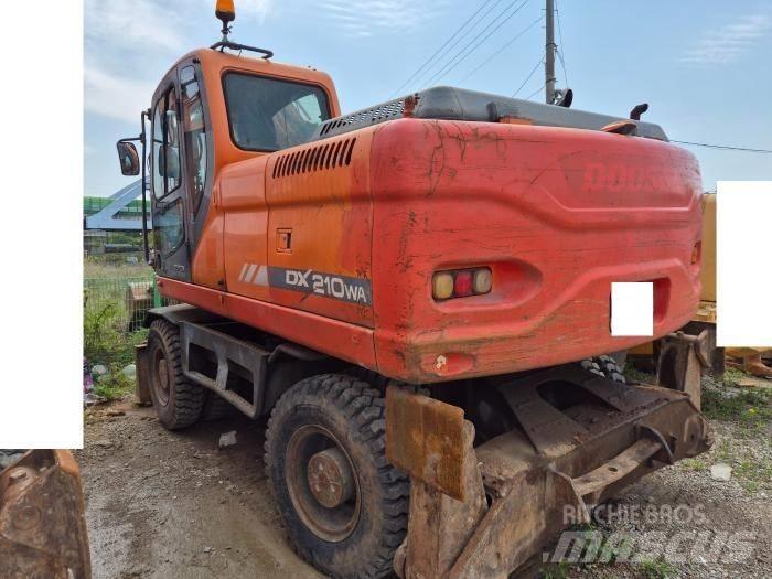 Doosan DX210WA Колёсные экскаваторы