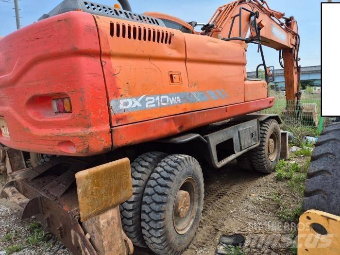 Doosan DX210WA Колёсные экскаваторы