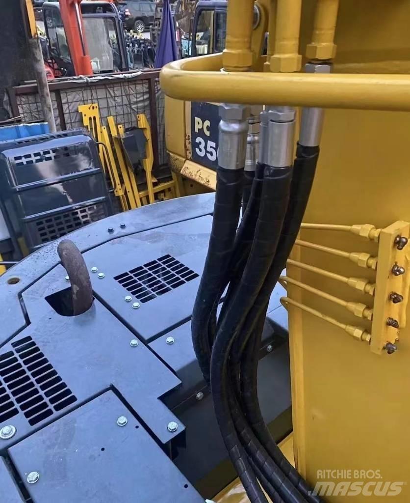 Komatsu 128 US Гусеничные экскаваторы