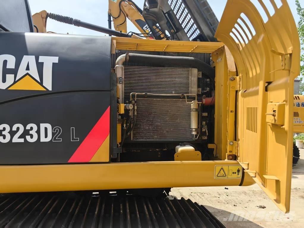 CAT 323 D Гусеничные экскаваторы