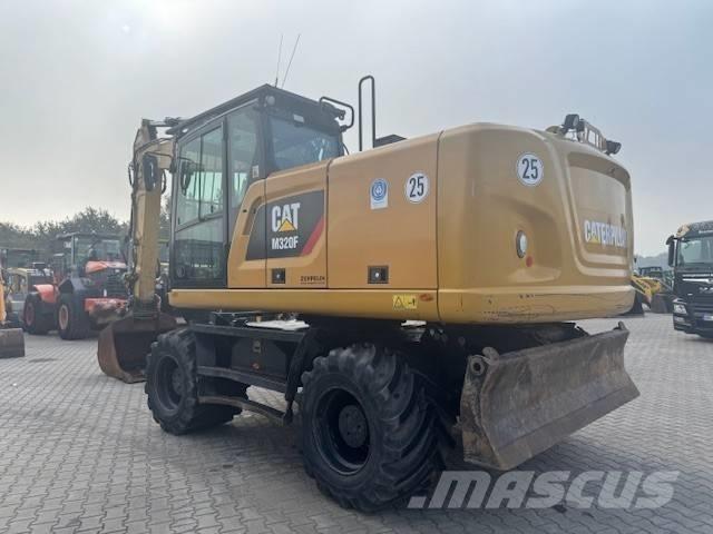 CAT M 320 F Колёсные экскаваторы