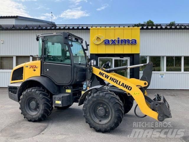 New Holland W70c Фронтальные погрузчики