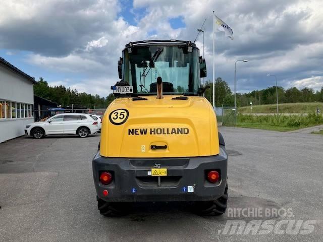 New Holland W70c Фронтальные погрузчики