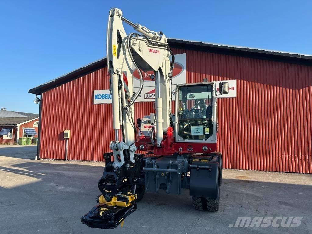 Takeuchi TB 395 W Колёсные экскаваторы