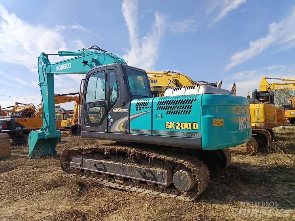 Kobelco SK200D Гусеничные экскаваторы