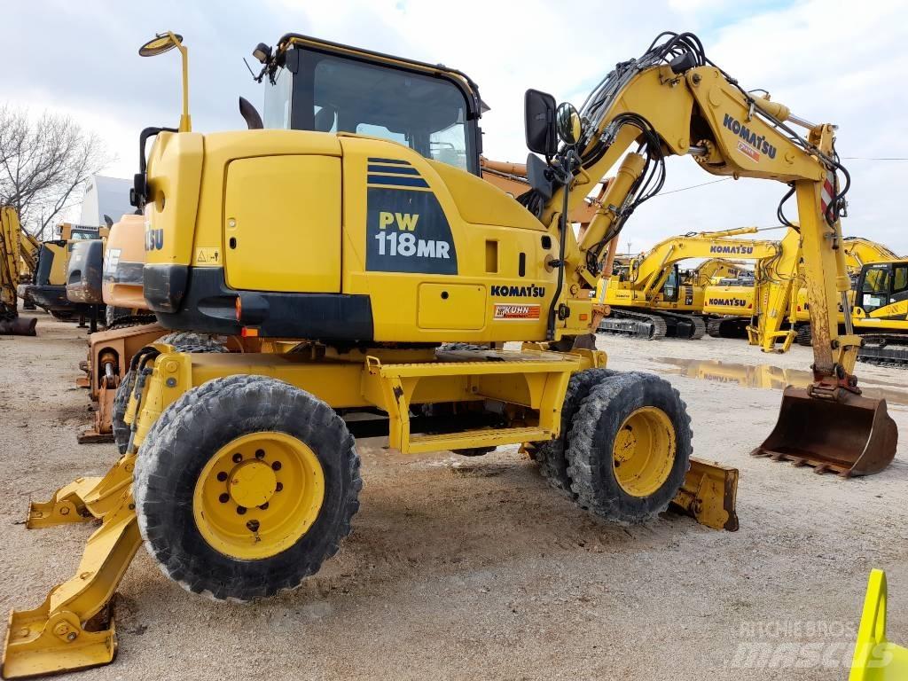 Komatsu PW118MR-8 Колёсные экскаваторы