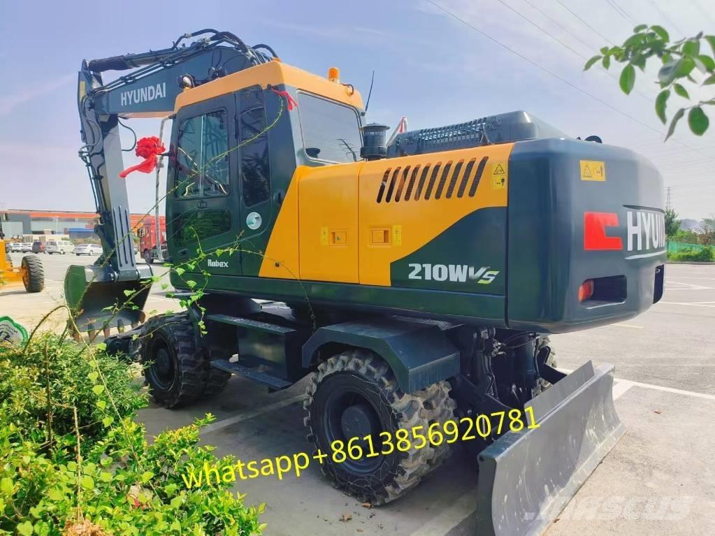 Hyundai W210-9 Колёсные экскаваторы
