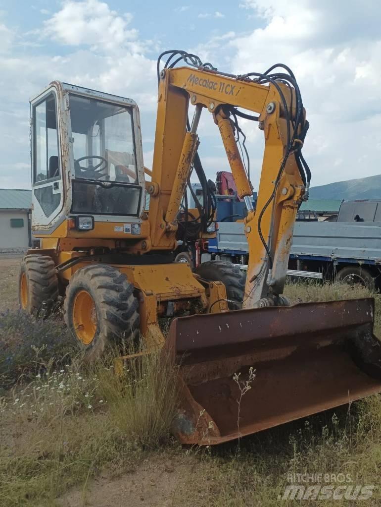 Mecalac 11 CX Колёсные экскаваторы